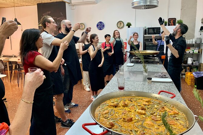 Valencian paella cooking class, tapas and visit to Ruzafa market. - Hands-on Valencian paella cooking: chicken, rabbit, saffron, and timing