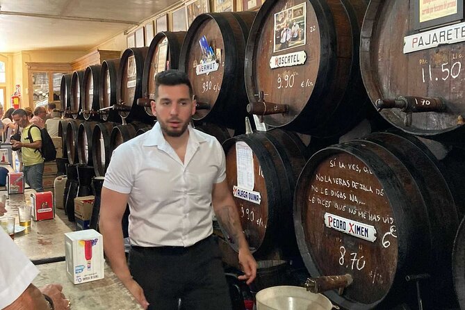 Wine and Tapas walking Tour in Malaga - Stop Three: Electric Atmosphere, Best Local Foods and Drinks